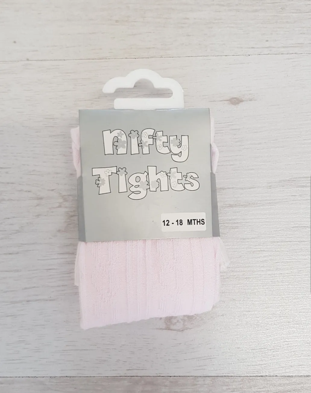 Pale pink ribbed tights